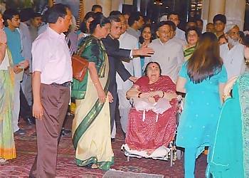 Shri Mataji, aged 82 years-old, on a wheelchair to witness Her husband's outstanding achievement